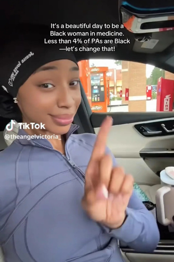 Influencer in a car, making a point about her career journey as a Black woman in medicine. Influencer in a car, making a point about her career journey as a Black woman in medicine.