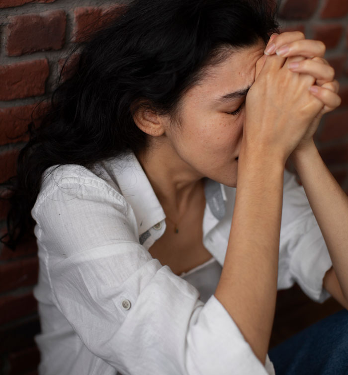 A distressed bride with her head in her hands, reflecting on her future MIL and fiancée's actions. A distressed bride with her head in her hands, reflecting on her future MIL and fiancée's actions.