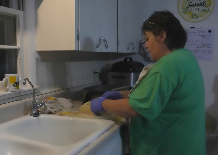 The Missouri grandma preparing free breakfasts for her neighbors in her kitchen. The Missouri grandma preparing free breakfasts for her neighbors in her kitchen.