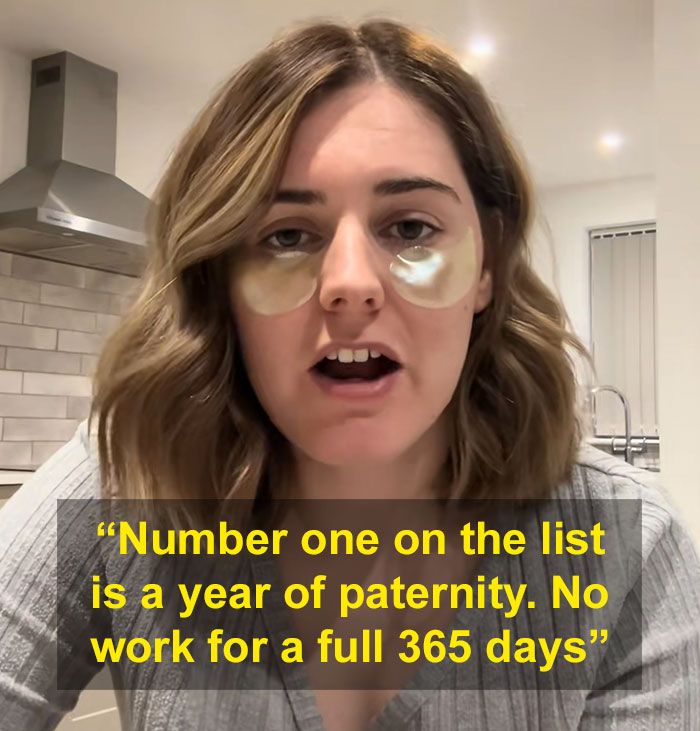 A woman with under-eye masks, discussing paternity leave as a reason for not having kids. A woman with under-eye masks, discussing paternity leave as a reason for not having kids.