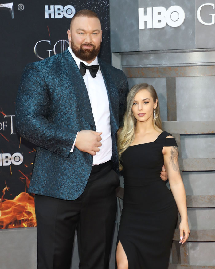Game of Thrones The Mountain, 6'9, with his 5'2 wife at an event. Game of Thrones The Mountain, 6'9, with his 5'2 wife at an event.
