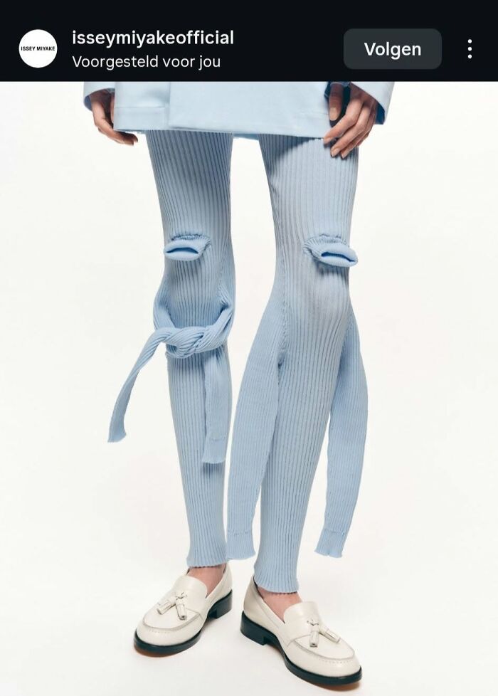 A person wears baby blue ribbed fashion tights with knee cutouts and ties, a prime example of bad fashion.