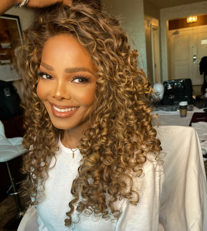 Janet Jackson, one of the worst celebrities encountered by a top producer, smiling. Janet Jackson, one of the worst celebrities encountered by a top producer, smiling.