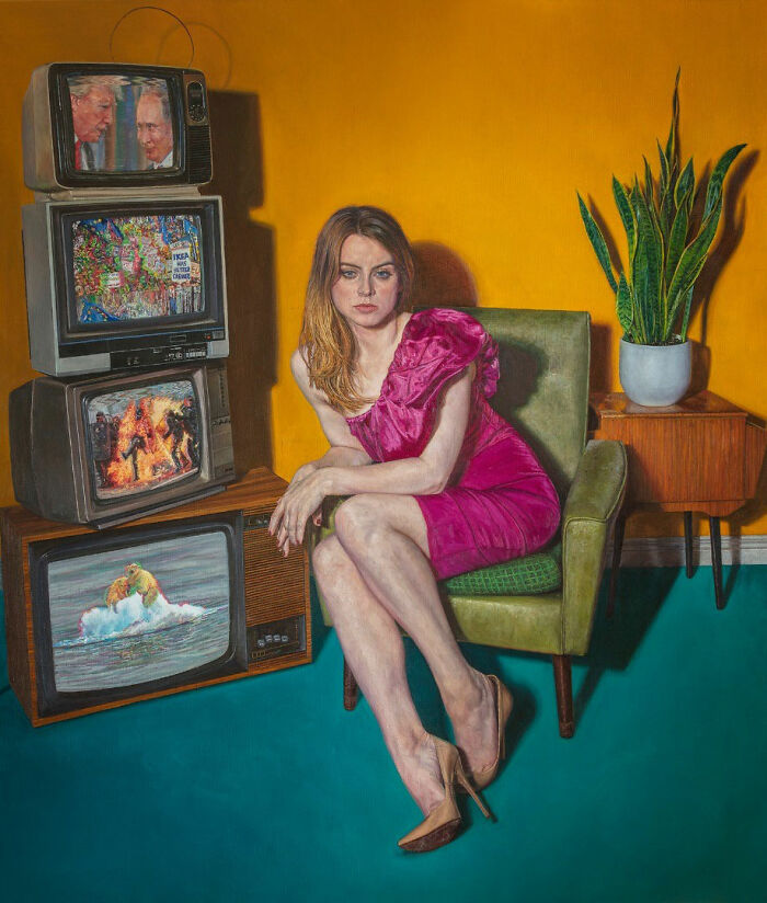 Hyperrealist paintings by Ian Cumberland: a woman in a pink dress sits in a chair surrounded by stacked TVs.