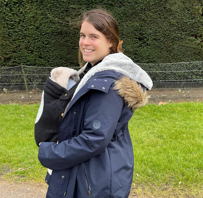 Princess Eugenie smiles, carrying her baby in a carrier, on her birthday, avoiding Meghan Markle's karma. Princess Eugenie smiles, carrying her baby in a carrier, on her birthday, avoiding Meghan Markle's karma.
