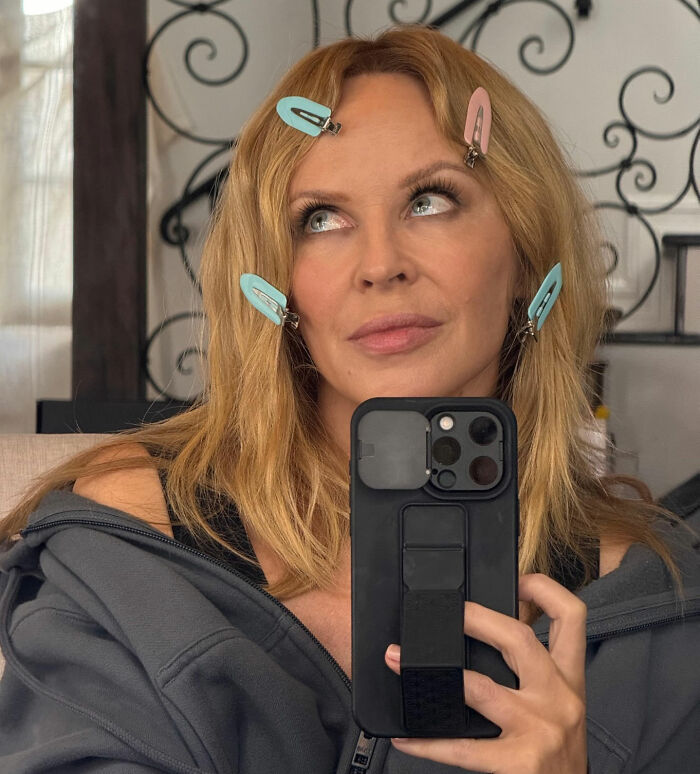 Kylie Minogue, one of the worst celebrities encountered by a top producer, taking a selfie. Kylie Minogue, one of the worst celebrities encountered by a top producer, taking a selfie.