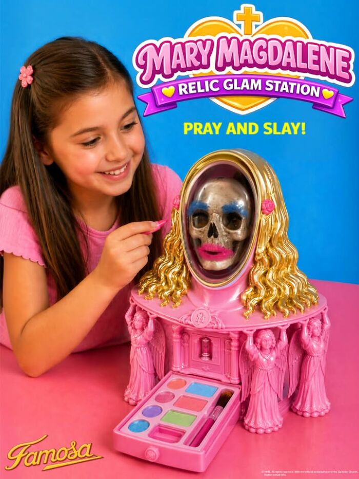 A young girl happily applies makeup to a Mary Magdalene Relic Glam Station figurine, a skull with blonde hair.