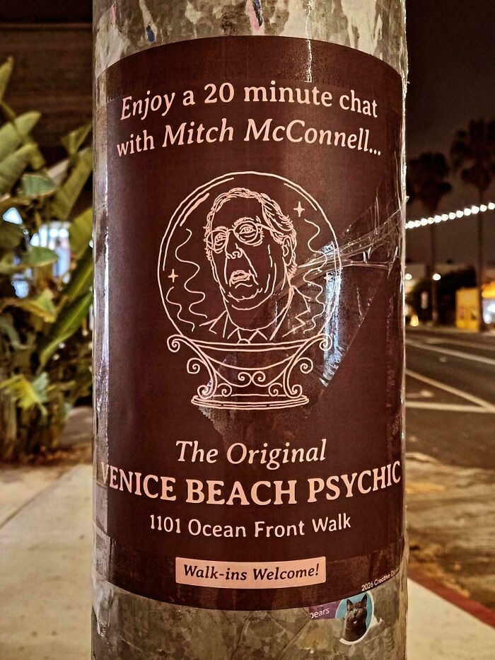 A chaotic good post from real life featuring a Venice Beach Psychic ad with Mitch McConnell.
