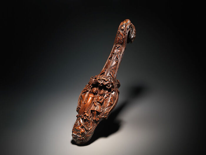 Intricately carved wooden artifact, a fascinating glimpse into the Middle Ages and human history.