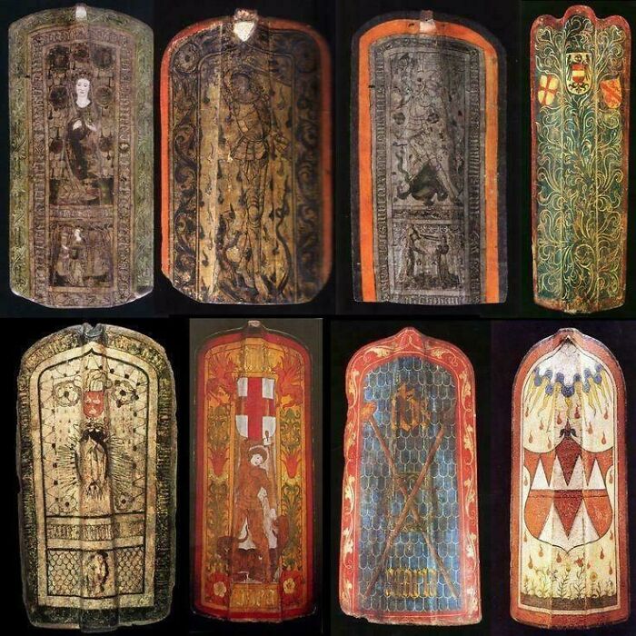 Collection of various decorated medieval shields, showcasing the diverse art of the Middle Ages.