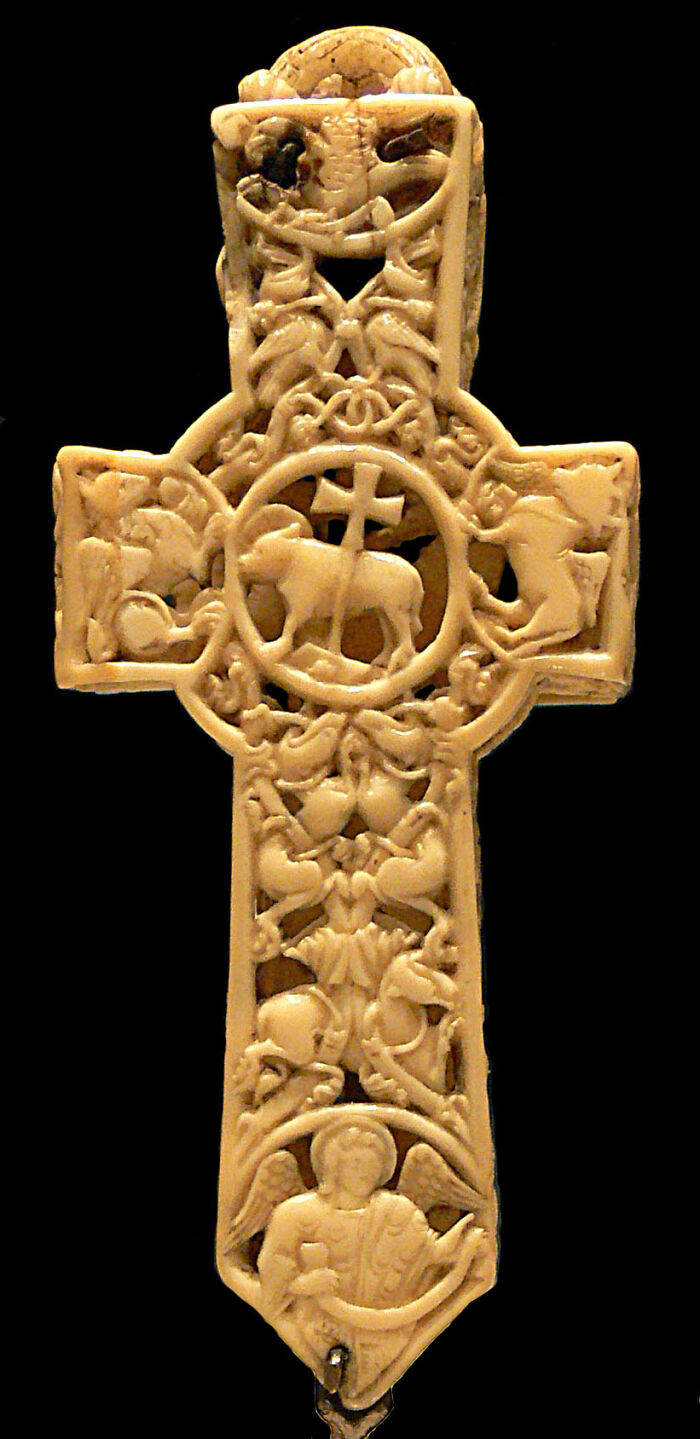 Intricate carved ivory cross, a fascinating artifact from the Middle Ages.