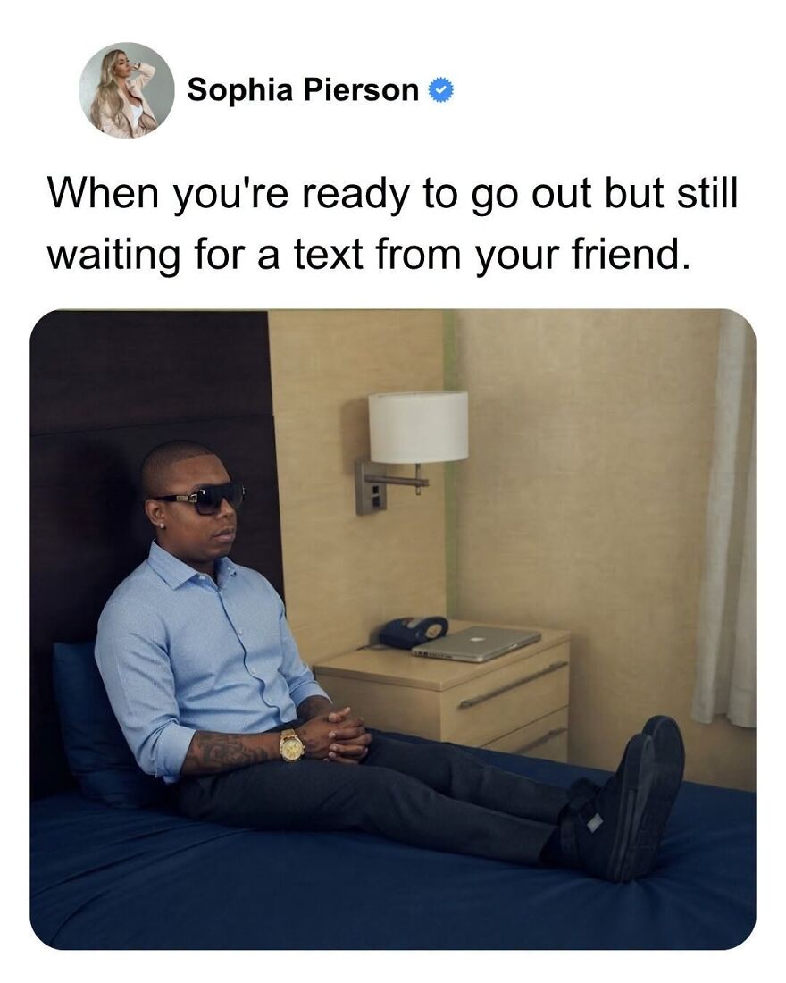 A man in sunglasses sits on a bed, waiting for a text. Hilarious memes take inspiration from real life.