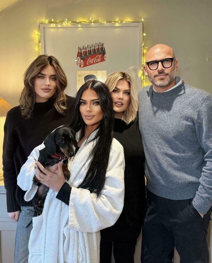Family photo with distinct social media poses and appearances, including a woman holding a dog.