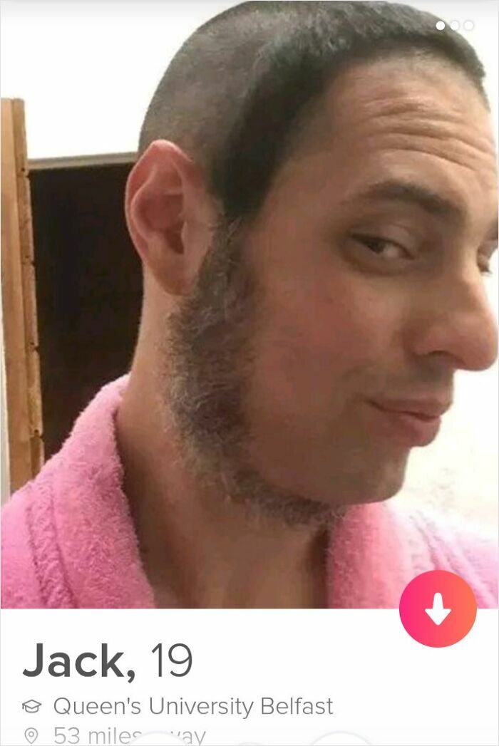 A man named Jack with a bold, partially shaved head and sideburns, looking sideways at the camera.