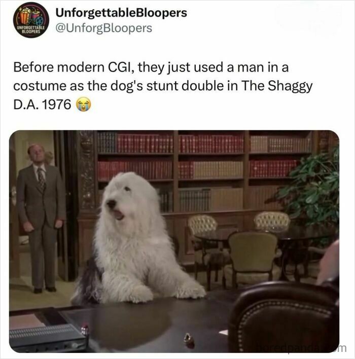 Man in a dog costume on a desk, a stunt double from a movie, showing interesting posts about media.