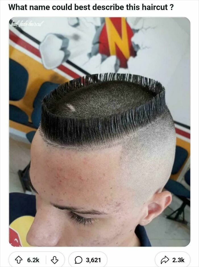 A man with a bold, circular buzzcut hairstyle, featuring short, spiky hair on top and completely shaved sides.