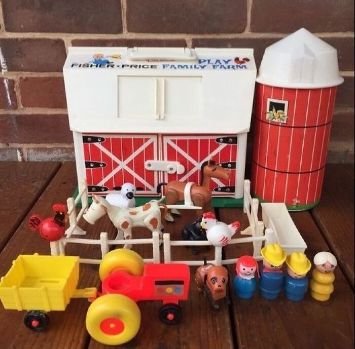 A classic Fisher-Price Family Farm playset with animals and figures, a beloved toy from the '80s.