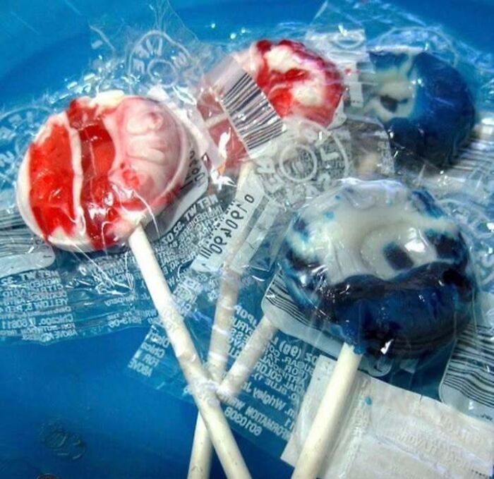 Three colorful brain-shaped lollipops, a sweet treat many enjoyed during the good time of the 80s.