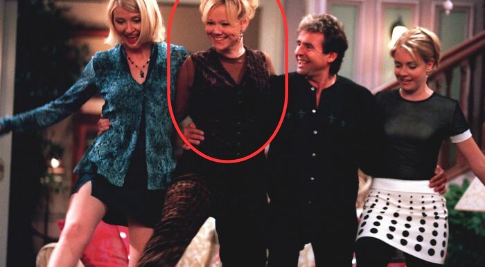 Hilda Spellman, circled in red, smiles standing with other TV show characters. What is her profession?