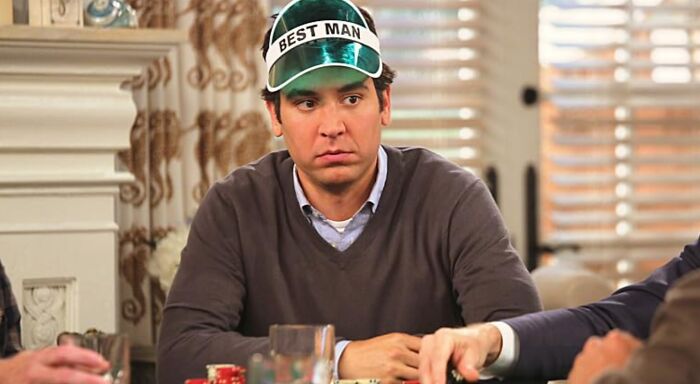 Ted Mosby, wearing a Best Man visor, looking apprehensive at a poker game. Character's profession quiz.