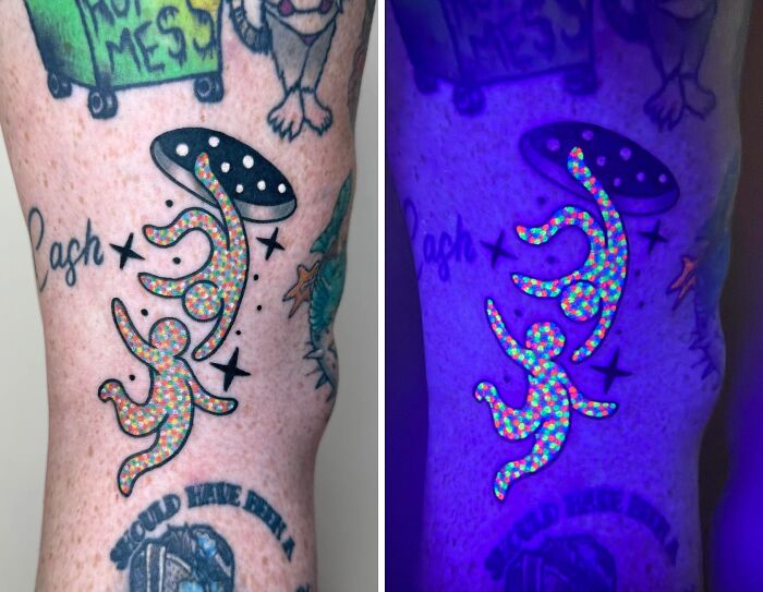 A split image of a leg tattoo in normal light and under UV light, revealing glowing, colorful figures holding a mushroom. A stunning tattoo.