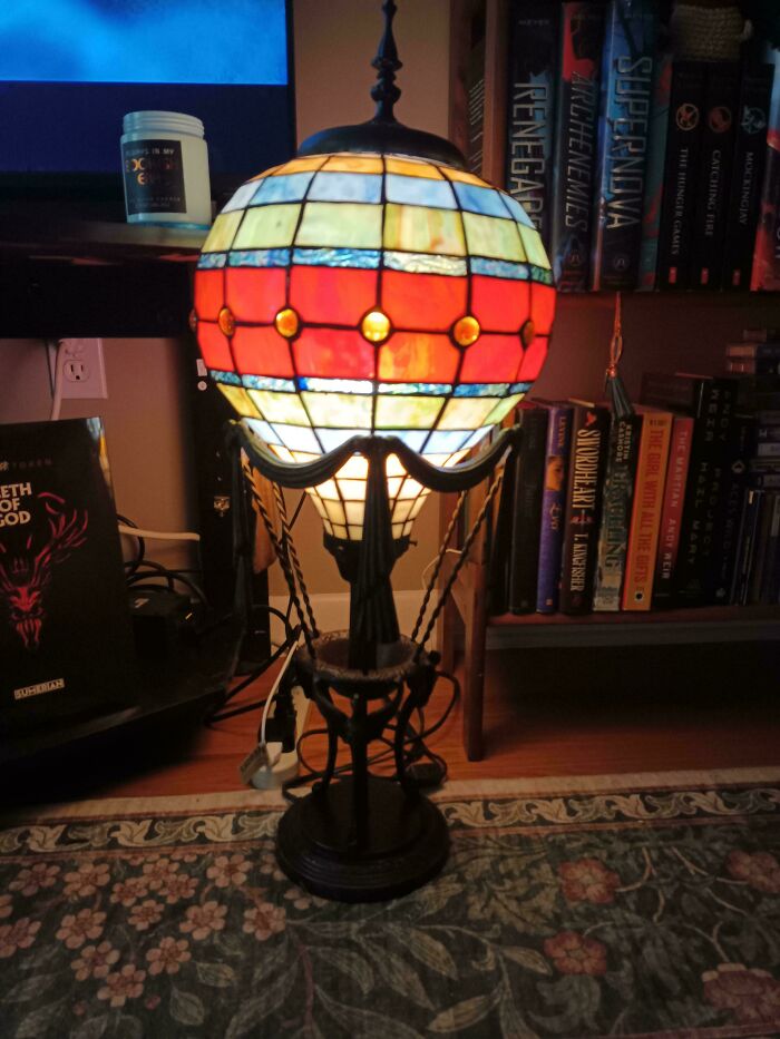 Stained glass lamp, resembling a hot air balloon, found at a thrift store, a true jackpot item.