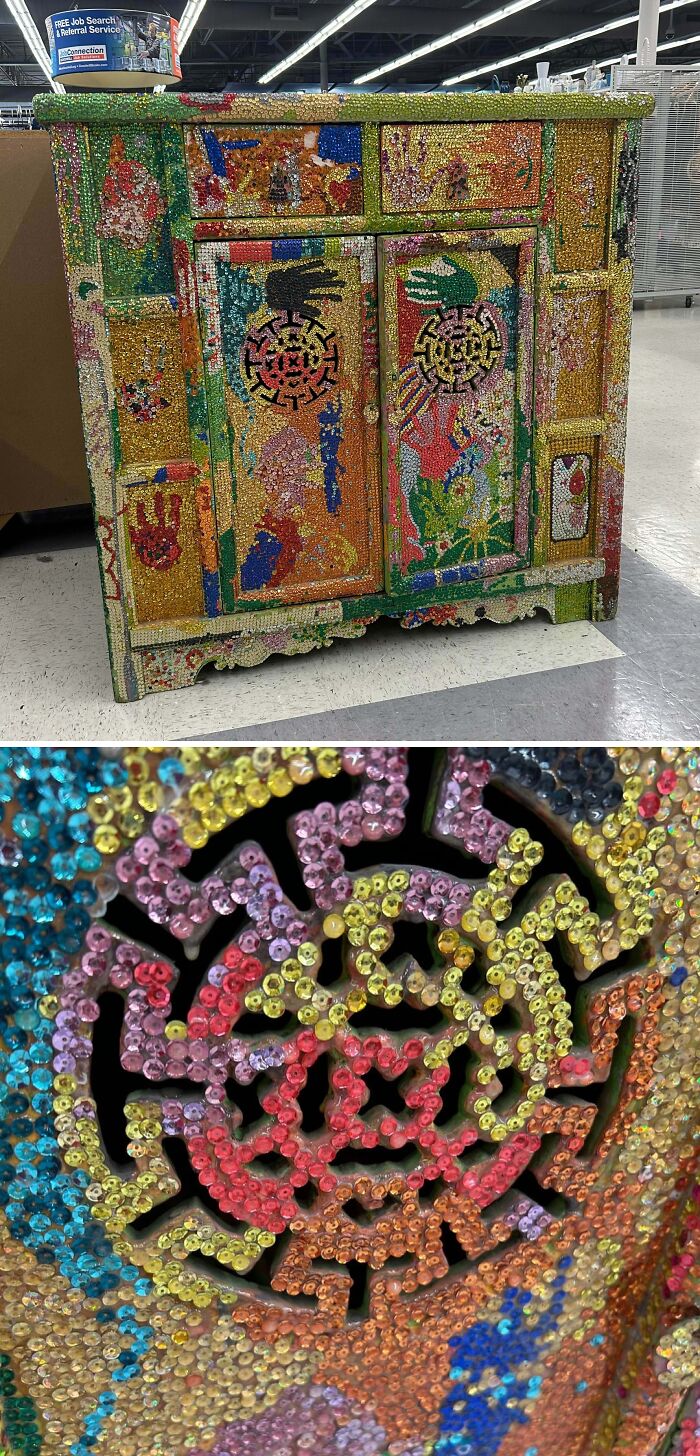 A vibrant, jeweled cabinet found at a thrift store, showcasing intricate, colorful beadwork and detailed patterns.