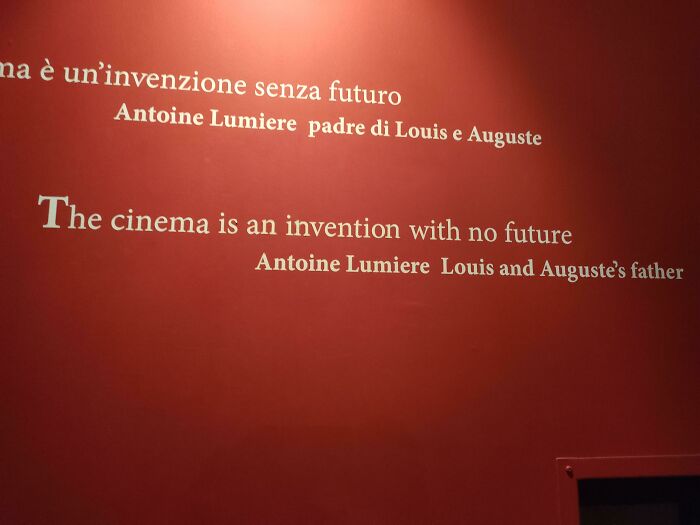 A red wall with white text stating The cinema is an invention with no future by Antoine Lumiere, which aged poorly.