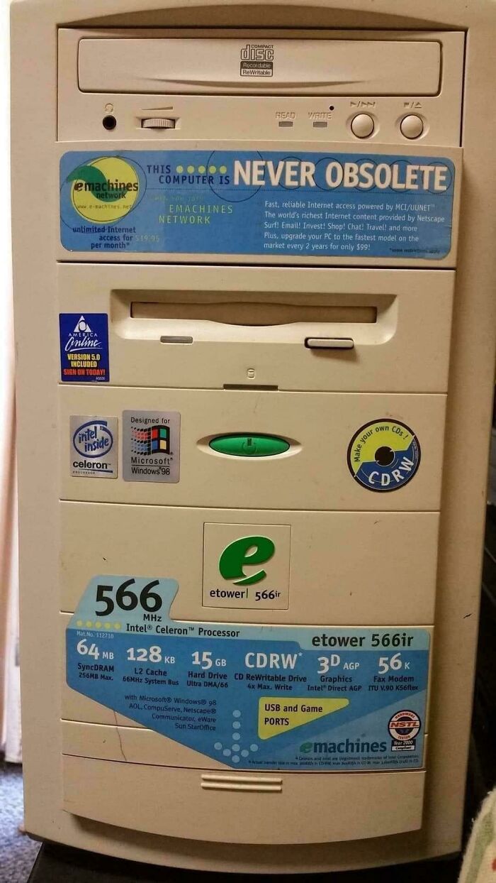 An old eMachines computer with a sticker proclaiming it is 'NEVER OBSOLETE,' which aged so poorly.