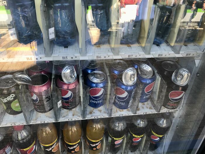 Vending machine with drinks inside, showcasing the summer melting effect.