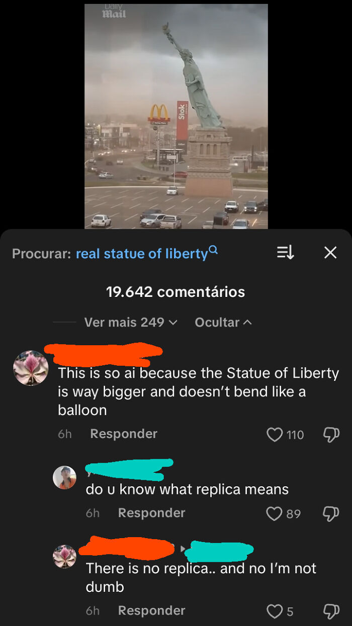 A video screenshot of the Statue of Liberty replica, with dumb people in comments believing it's AI or not understanding replicas.