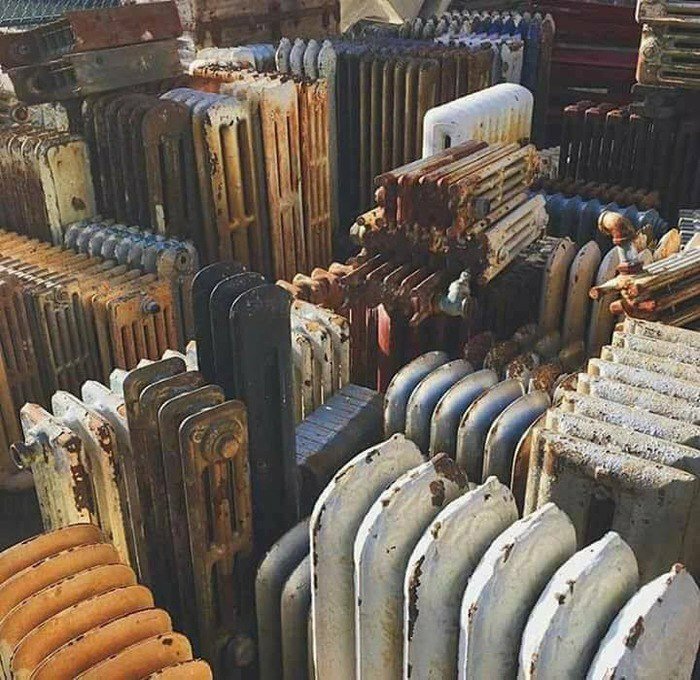 A large collection of old, rusted radiators, an example of confusing pics and misleading headlines.