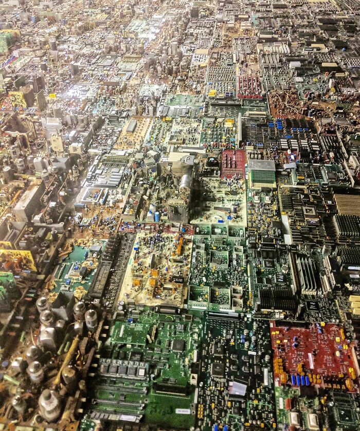 A sprawling aerial view of many circuit boards making up a confusing pic.