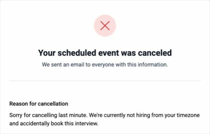 A cancelled job interview notice for a new job, stating the reason was accidental booking outside their hiring timezone.
