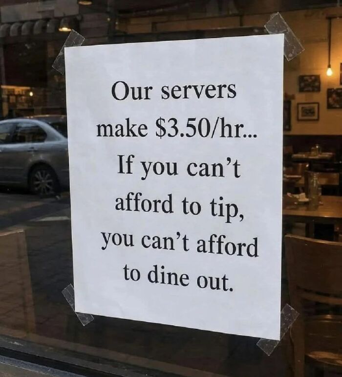A sign in a restaurant window, a LinkedIn meme, stating if you can't afford to tip, you can't afford to dine out, reflecting work-life balance issues.