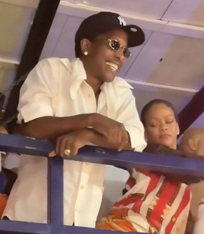 Rihanna and A$AP Rocky smiling together, enjoying a moment in their video, sparking uproar online. Rihanna and A$AP Rocky smiling together, enjoying a moment in their video, sparking uproar online.