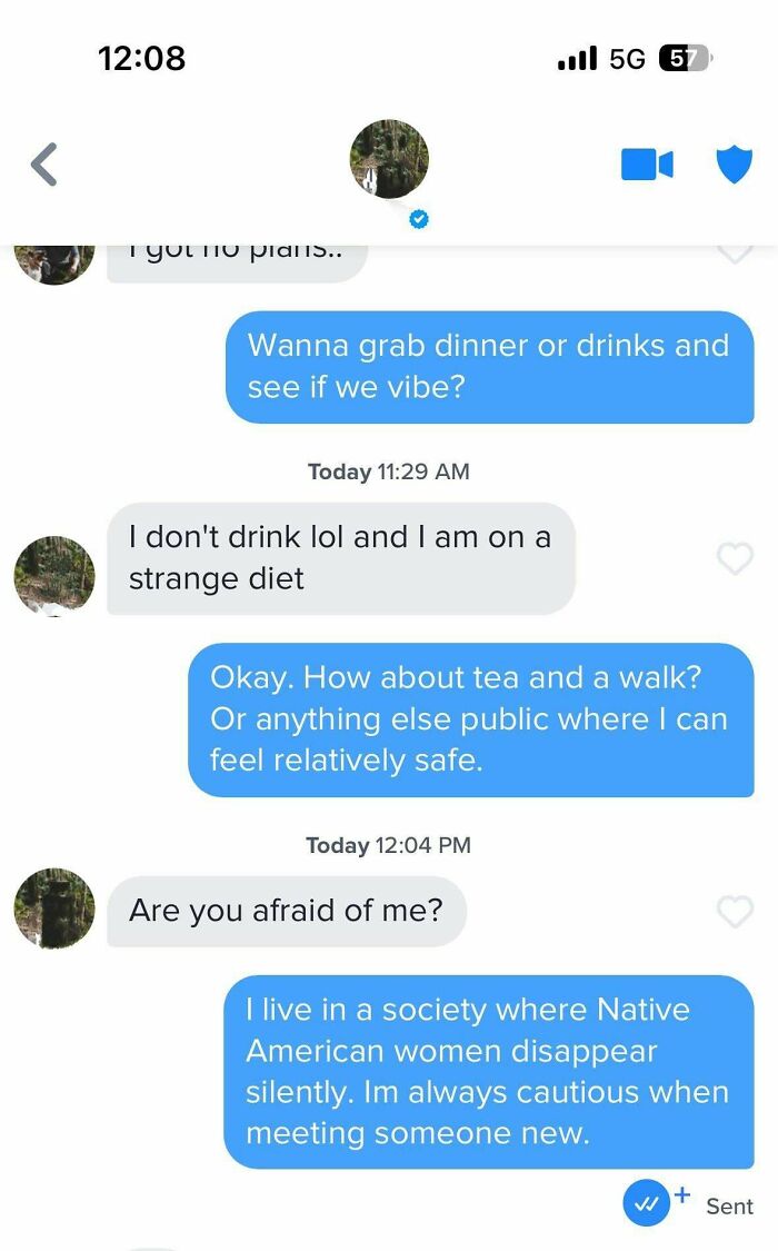 Wild online dating screenshot showing a user's cautious response when asked if they are afraid of the other person.