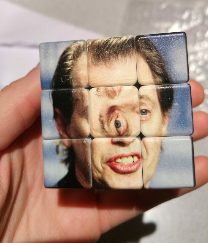 A weird pic of a Rubik's Cube featuring a distorted face, an image that people cannot explain or forget.