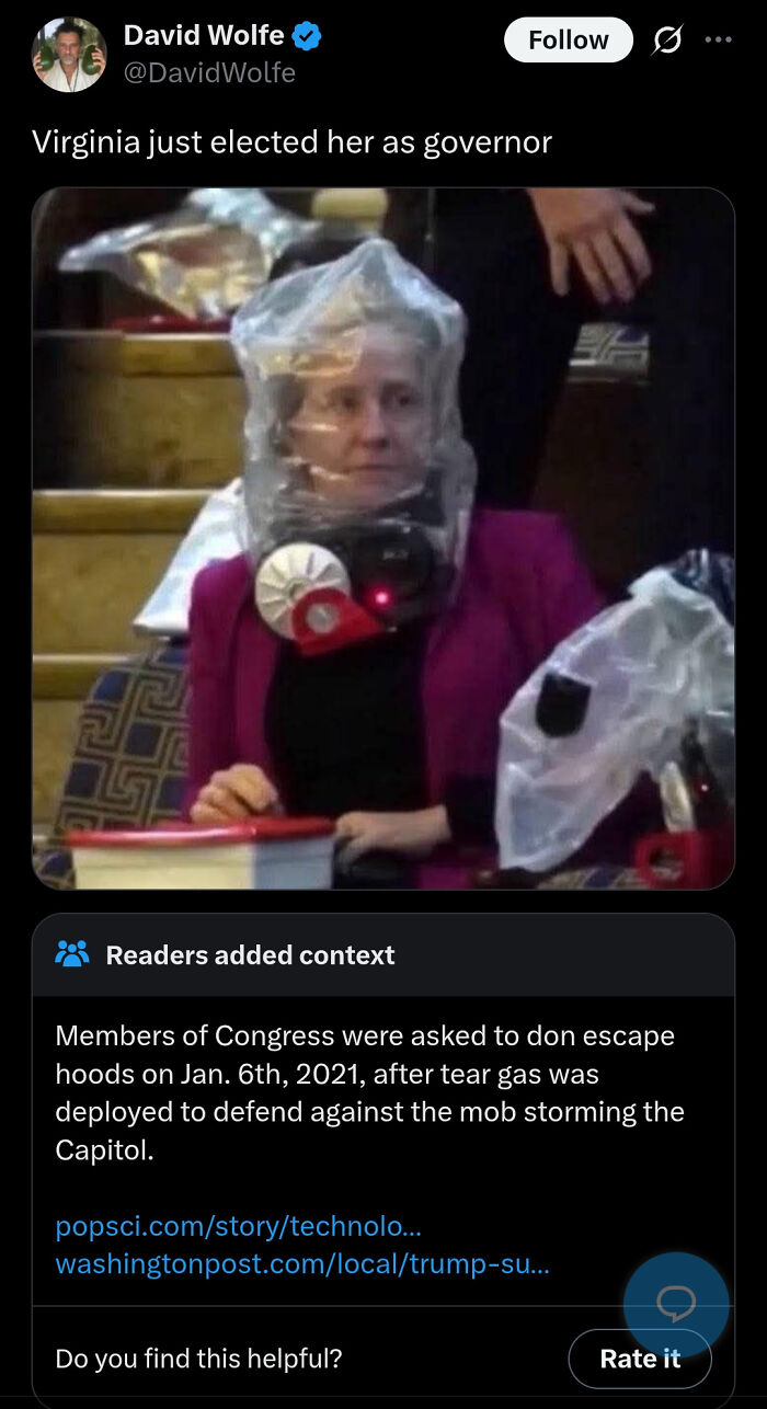 A woman wearing an escape hood during a fact-checked event, highlighting people who got fact-checked.