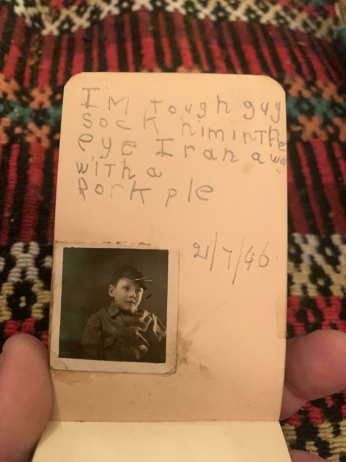 An old handwritten note with a photo of a boy, an example of fascinating ephemera.