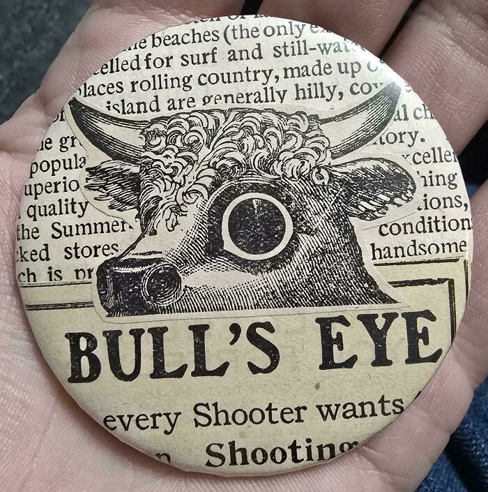 A vintage button featuring a bull's head and the text 'BULL'S EYE', a fascinating piece of ephemera reflecting the past.