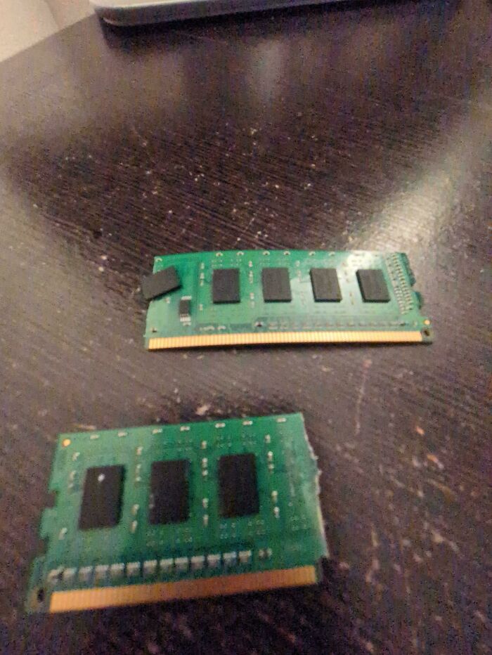 Two computer RAM sticks with chipped edges, highlighting the unexpected incidents parents face.