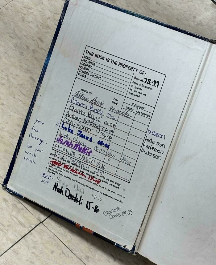 An old library book checkout card with handwritten names, a fascinating piece of ephemera from the past.