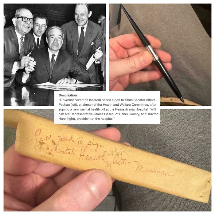 A black and white photo of Governor Scranton signing a bill, with a pen and its case, showing ephemera from the past.