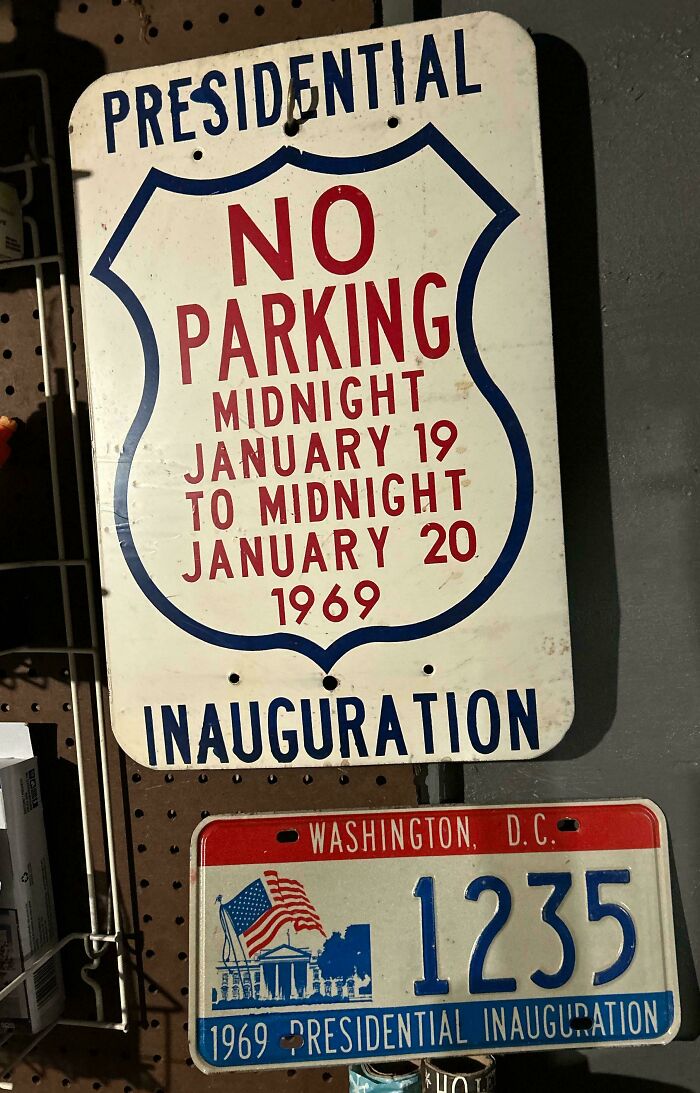 A Presidential Inauguration no parking sign and a 1969 Washington D.C. license plate, pieces of ephemera.