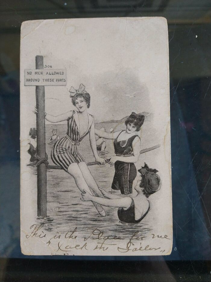 Black and white postcard of three women in old-fashioned swimsuits, illustrating how the past has changed.