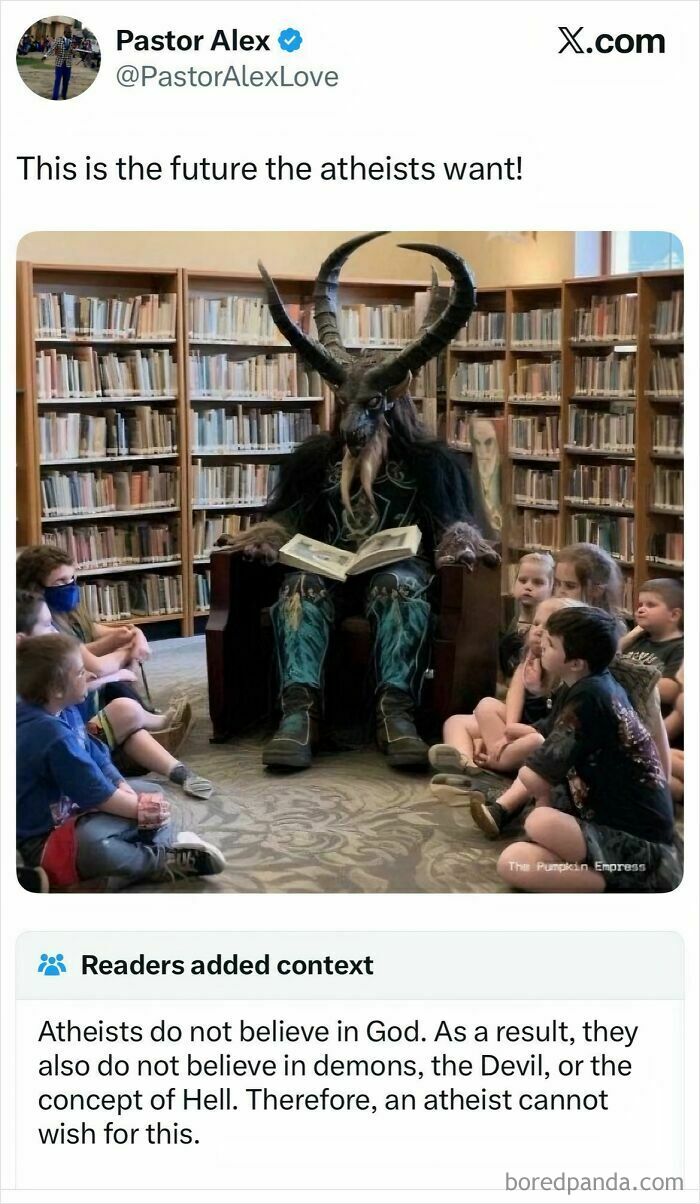 A horned figure in a library reading to children, with a fact-checked note clarifying atheists do not believe in demons.