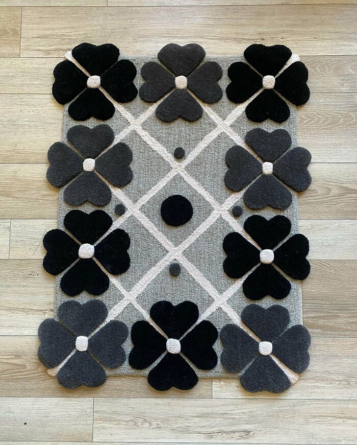 A unique grey and black flower-patterned rug, a brilliant DIY home project that can transform a space.