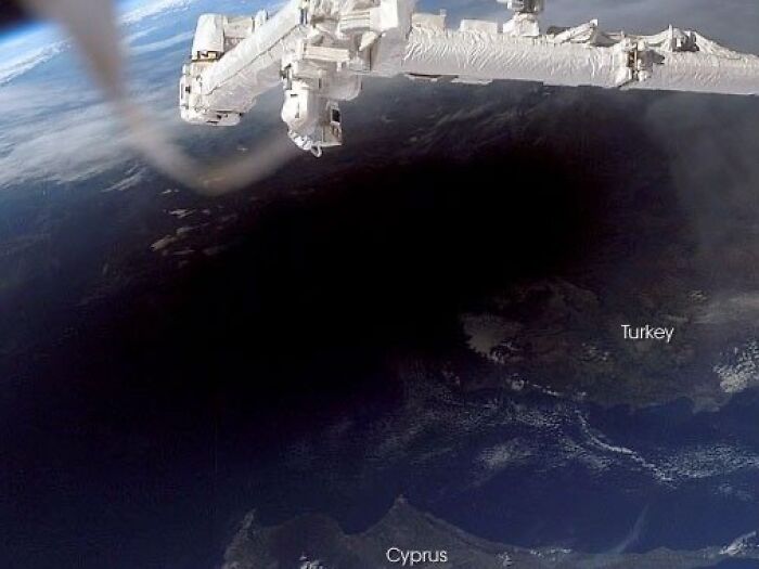Extraordinary solar eclipse photo seen from space, casting a large shadow over Turkey and Cyprus.
