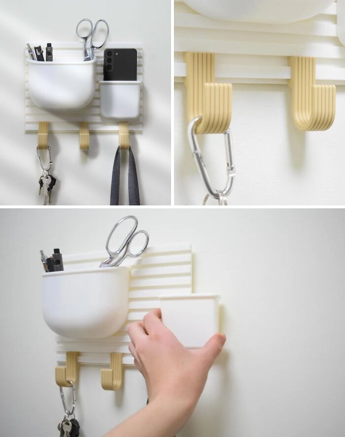 A 3D printed wall organizer holding keys, pens, scissors, and a phone, demonstrating brilliant things.
